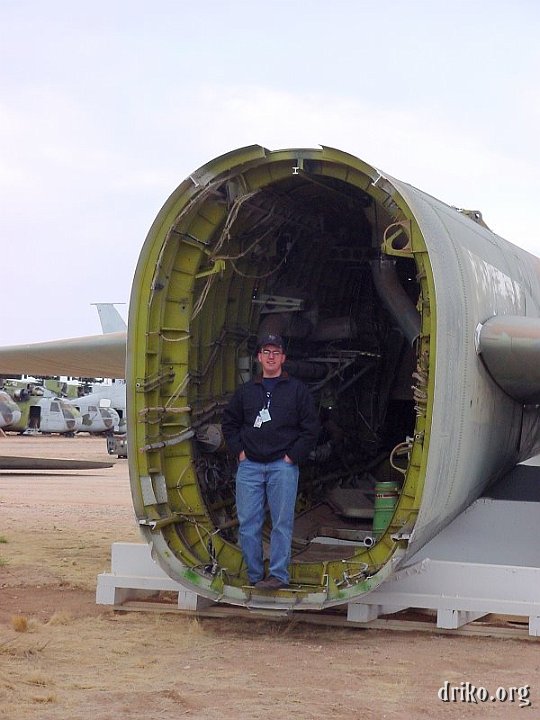 DSC00138.JPG - A colleague stands in a guillotined B-52 Fuselage