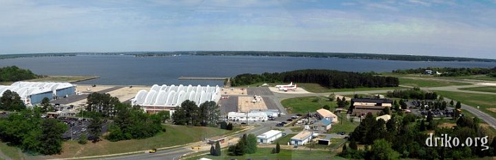 PaxRiverATC-Patuxentpanorama.JPG - Pax River Tower View Panorama 1   During the recent public tour, we were allowed to take pictures from atop the new Air Traffic Control tower.  This is a view looking north over the Patuxent River, with the Solomons Island bridge and the Calvert County coast visible in the background. 