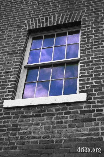 alexandria_window2.JPG - Window To The Sky...   The color of the sky in this Alexandria really caught my eye.  I converted all of the picture to black and white except for the blue sky's reflection to highlight the color.  This picture was taken in 2004. 